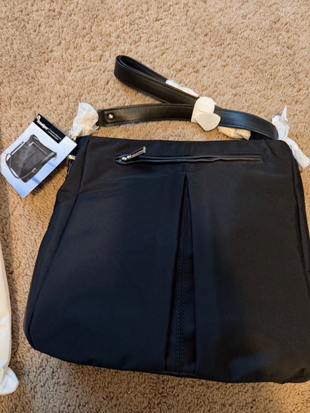 Black new with tags, travelpro black adjustable strap purse